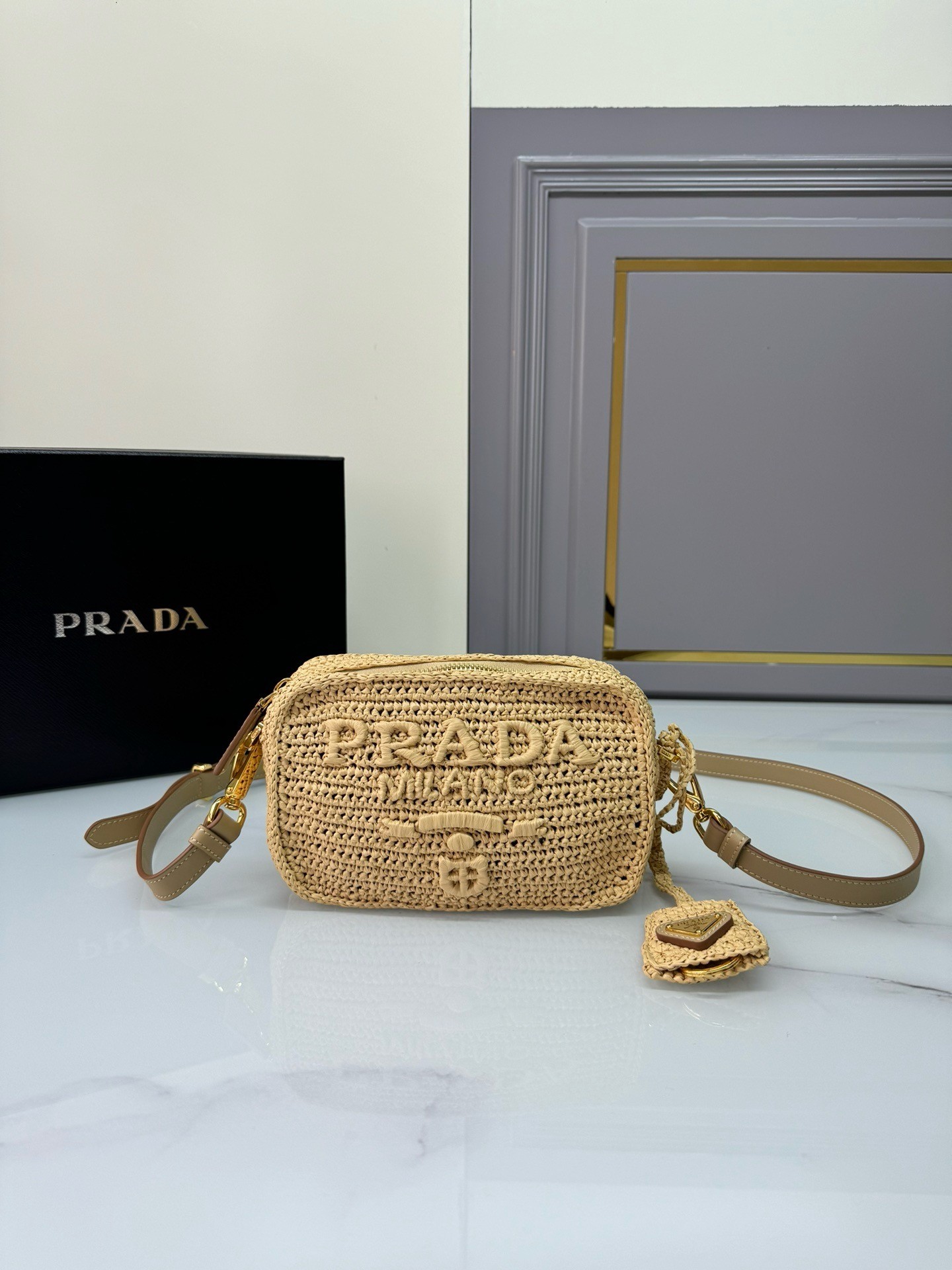Pra*a crochet shoulder bag in natural raffia-effect yarn