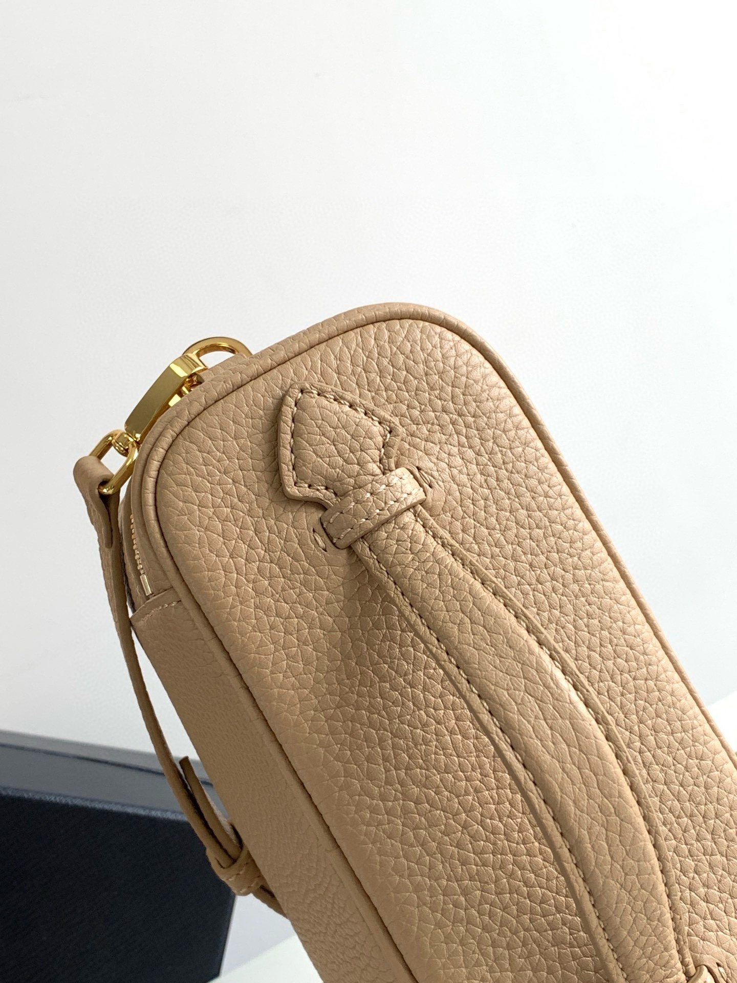 Pra*a mini vanity bag in sand beige grained leather