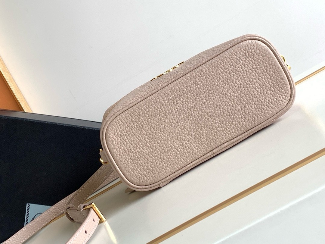 Pra*a mini vanity bag in light pink grained leather