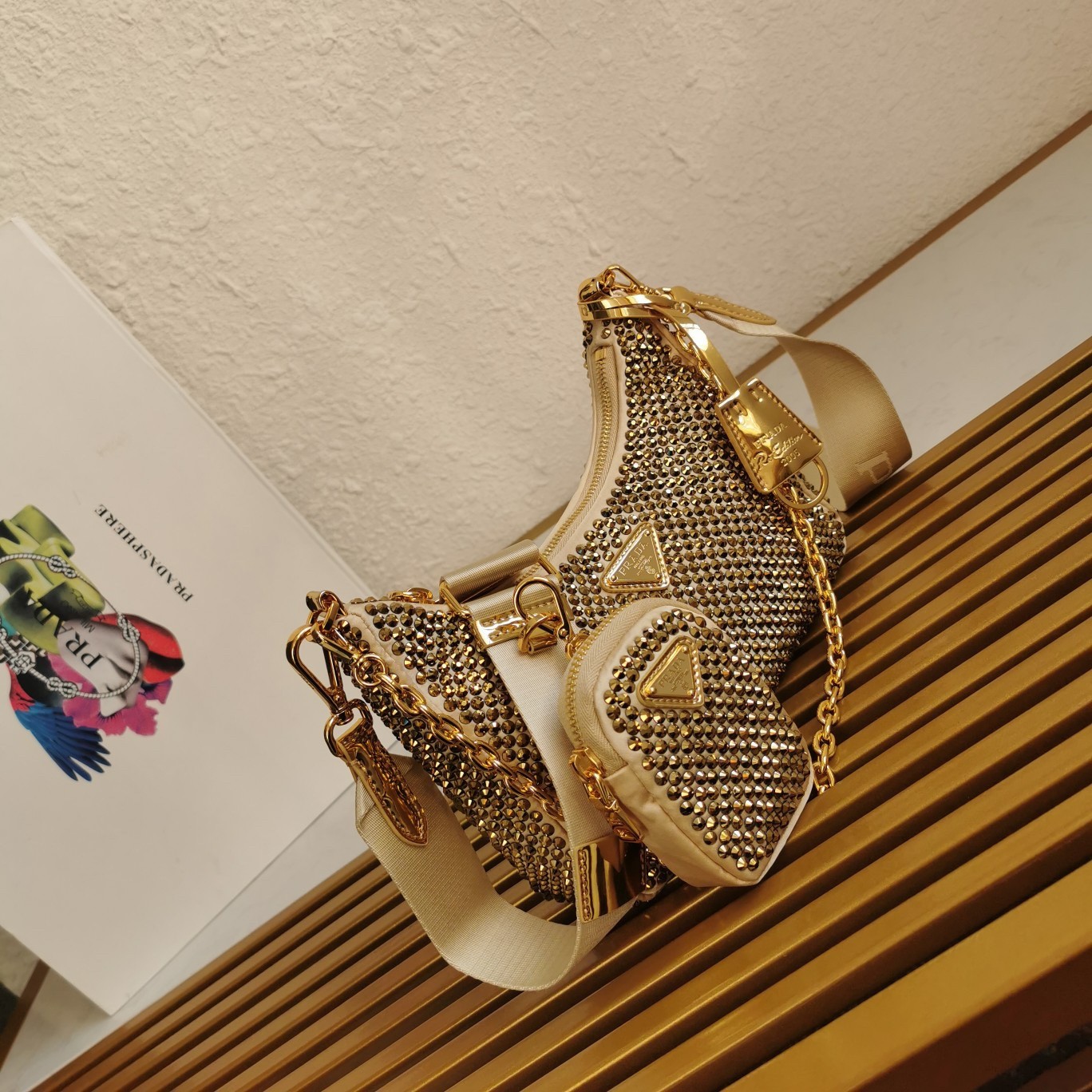Pra*a re-edition 2005 bag in gold satin with crystal