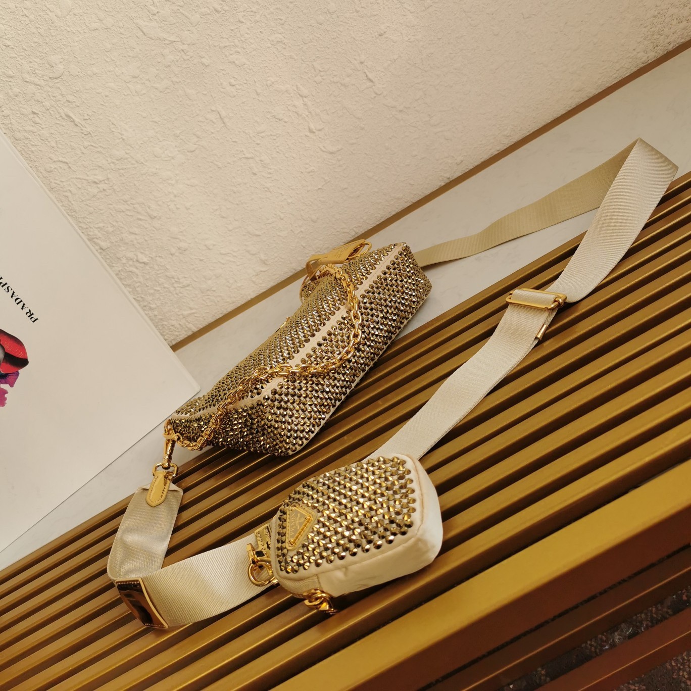 Pra*a re-edition 2005 bag in gold satin with crystal
