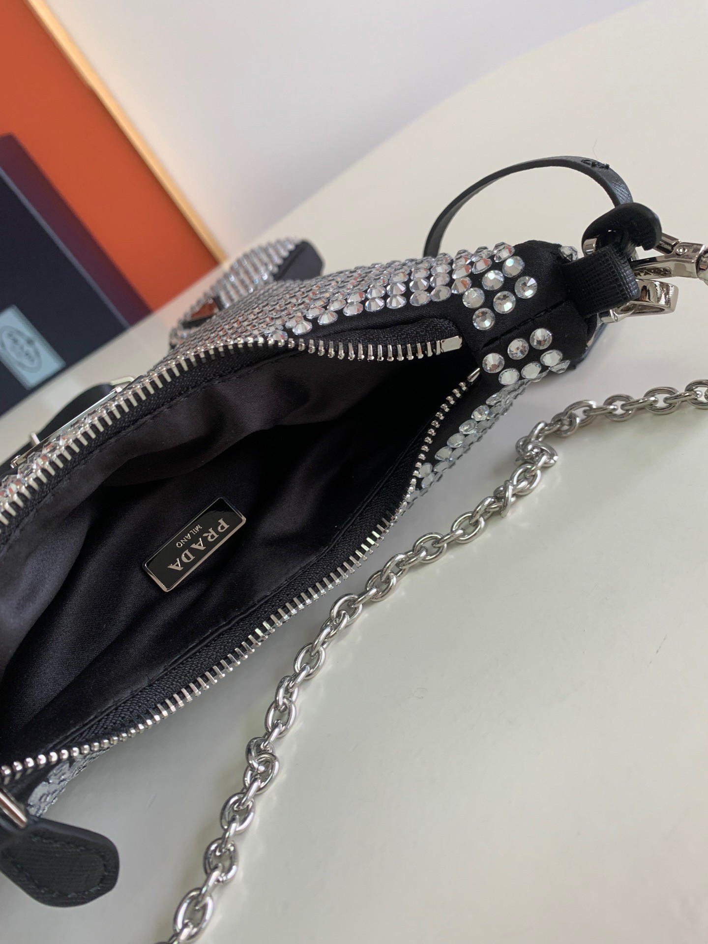 Pra*a re-edition 2005 bag in black satin with crystals