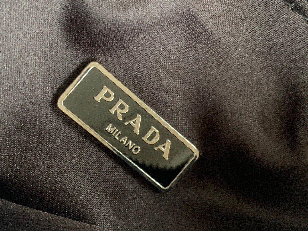 Pra*a re-edition 2005 bag in black satin with crystals