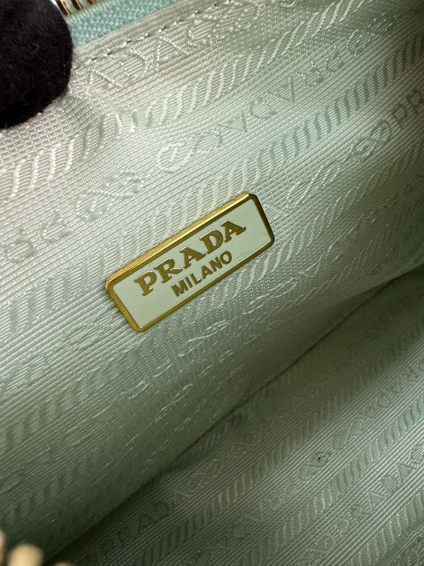 Pra*a re-edition 2005 crochet bag in aqua raffia