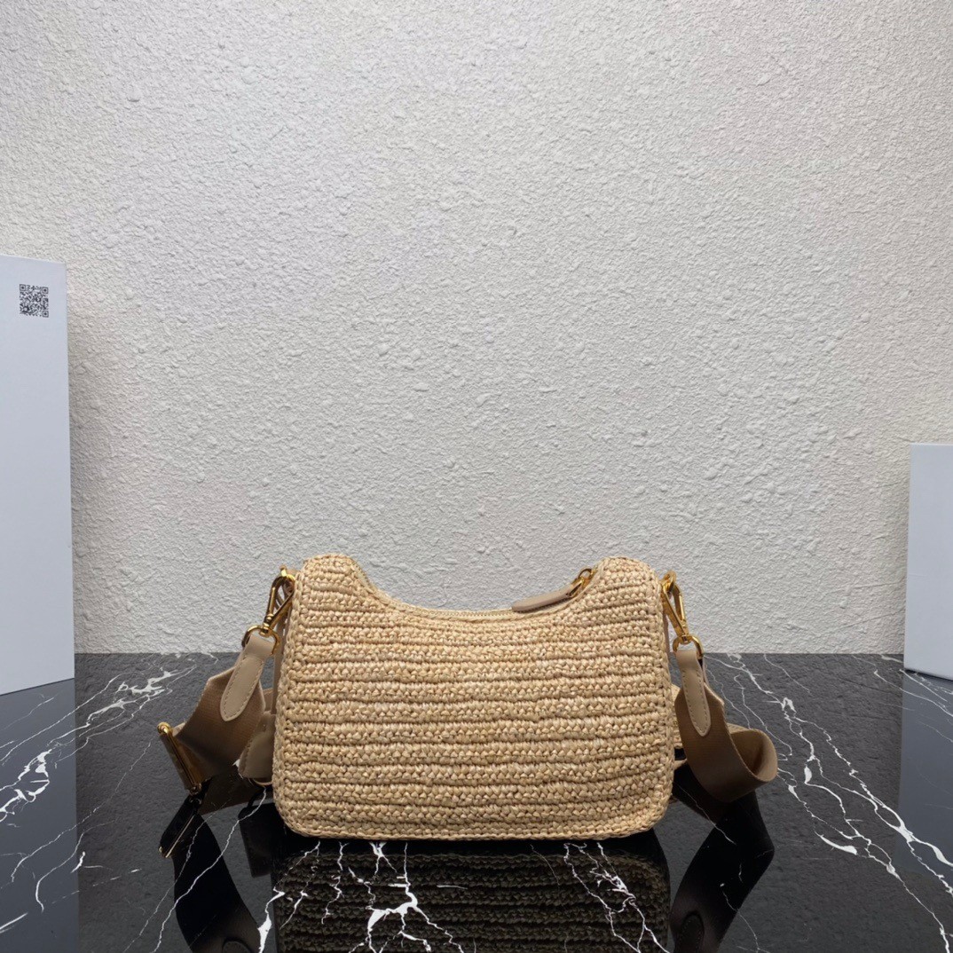 Pra*a re-edition 2005 shoulder bag in beige raffia