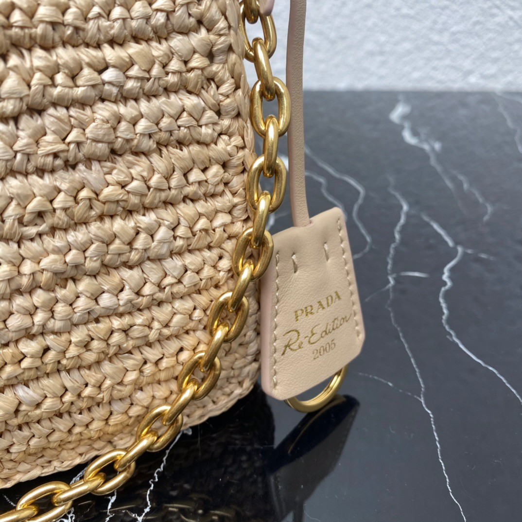 Pra*a re-edition 2005 shoulder bag in beige raffia