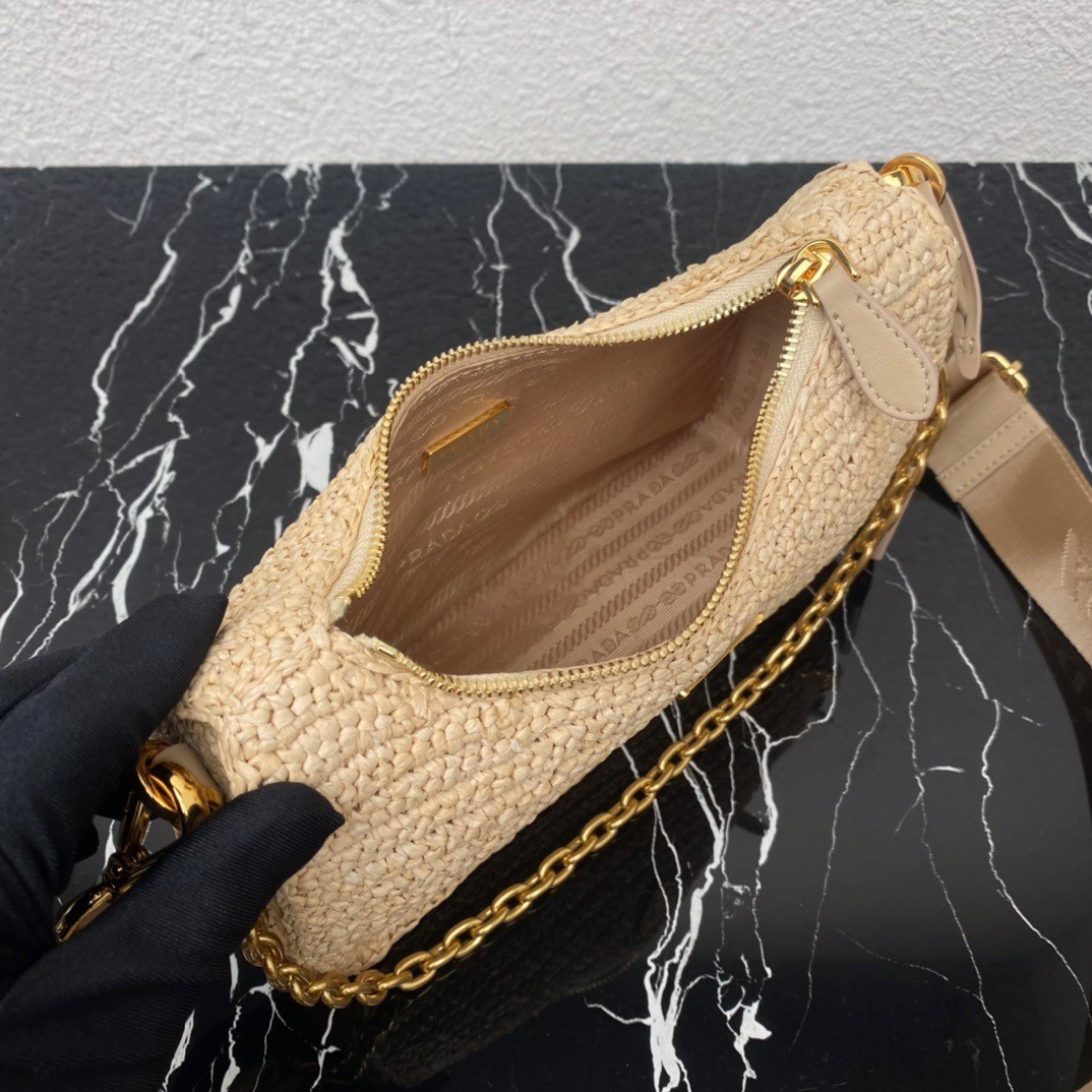 Pra*a re-edition 2005 shoulder bag in beige raffia
