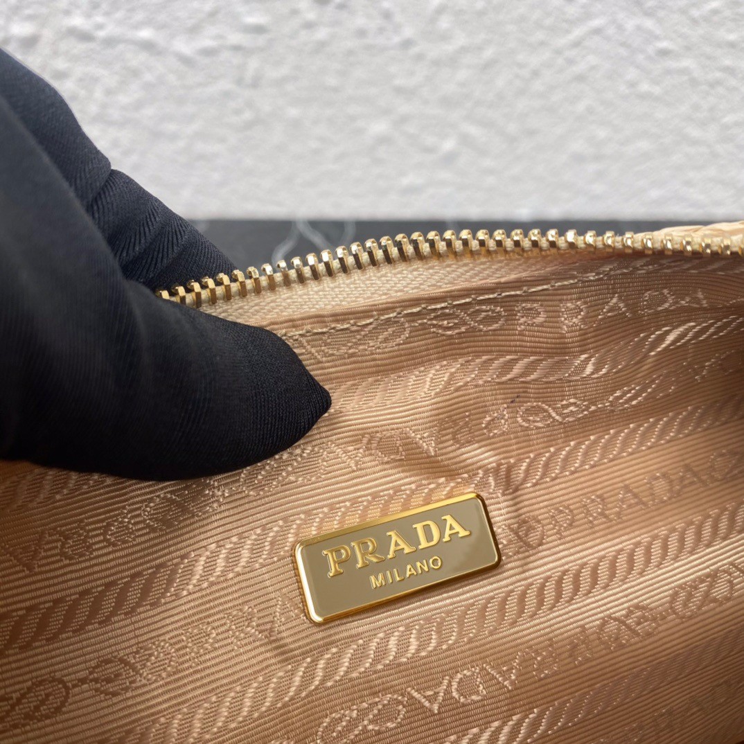Pra*a re-edition 2005 shoulder bag in beige raffia