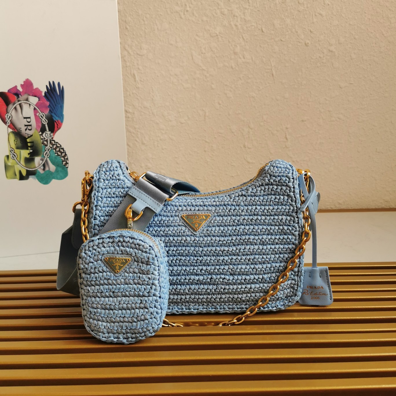Pra*a re-edition 2005 shoulder bag in blue raffia