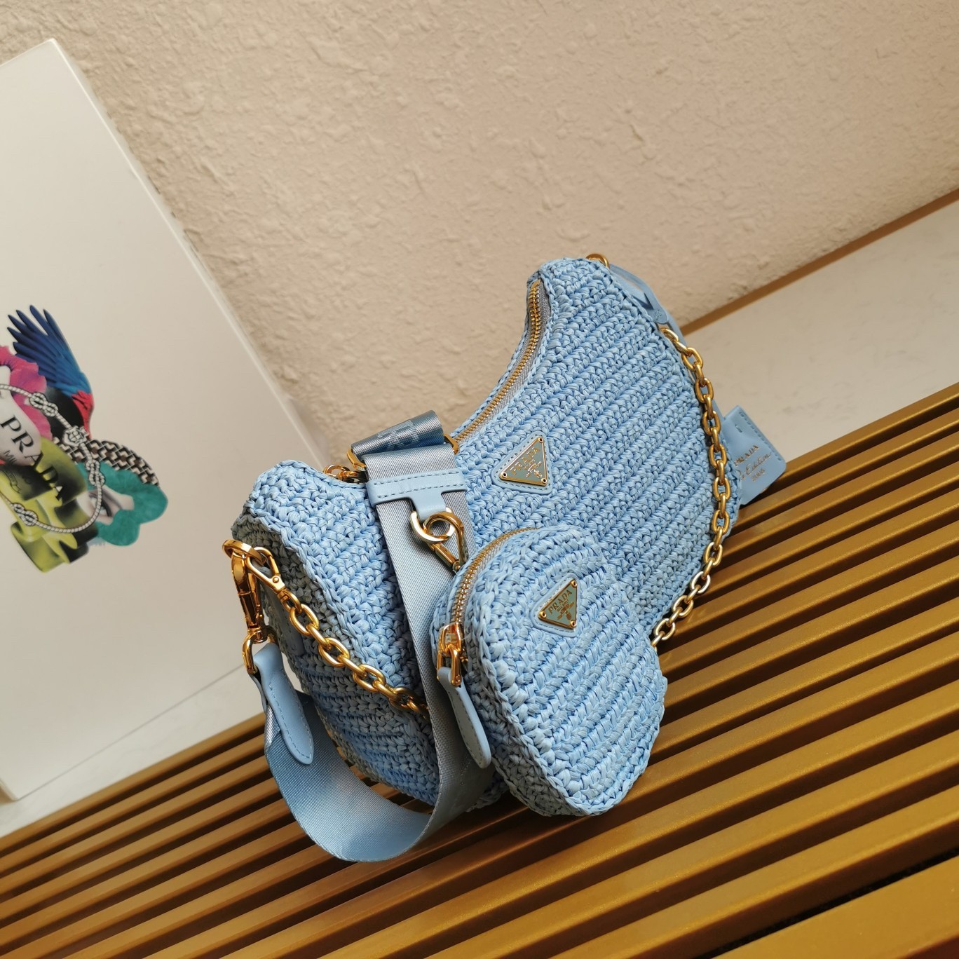 Pra*a re-edition 2005 shoulder bag in blue raffia