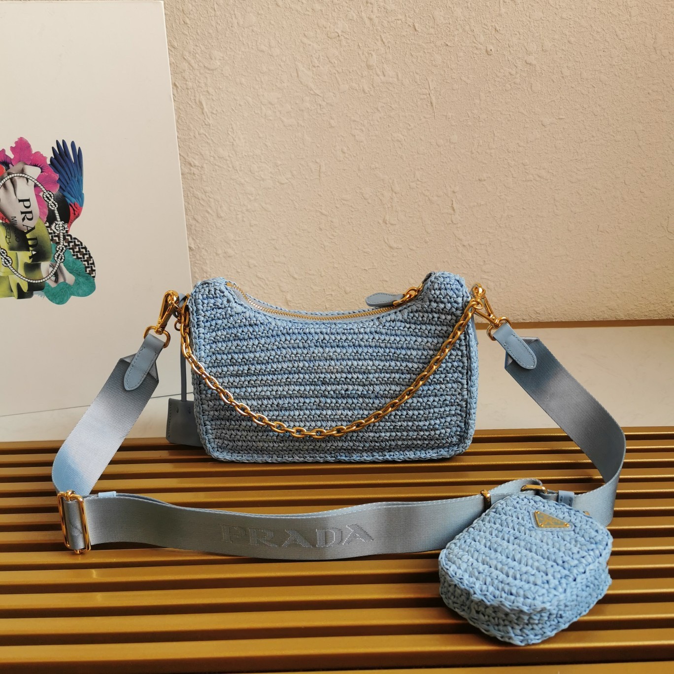 Pra*a re-edition 2005 shoulder bag in blue raffia
