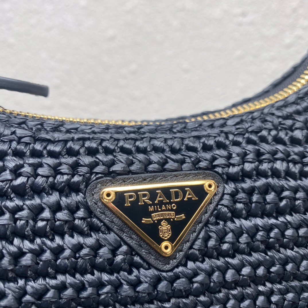 Pra*a re-edition 2005 shoulder bag in black raffia
