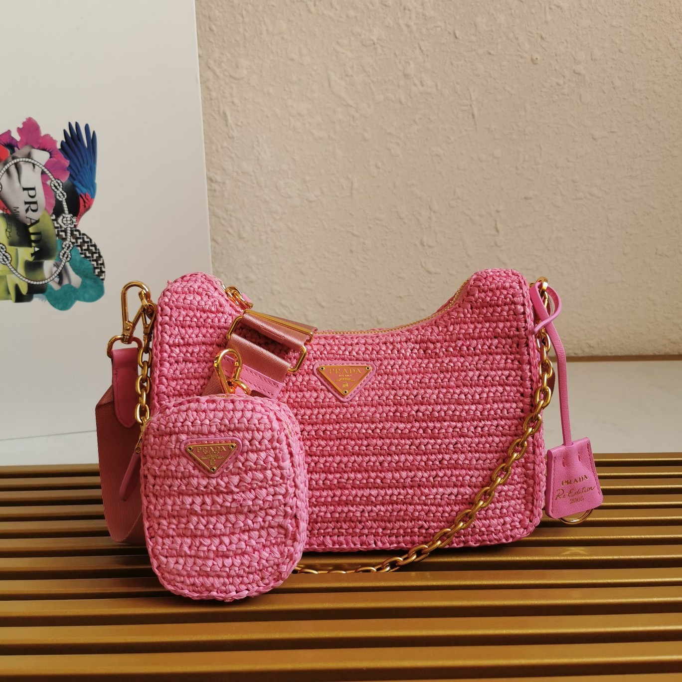 Pra*a re-edition 2005 shoulder bag in pink raffia