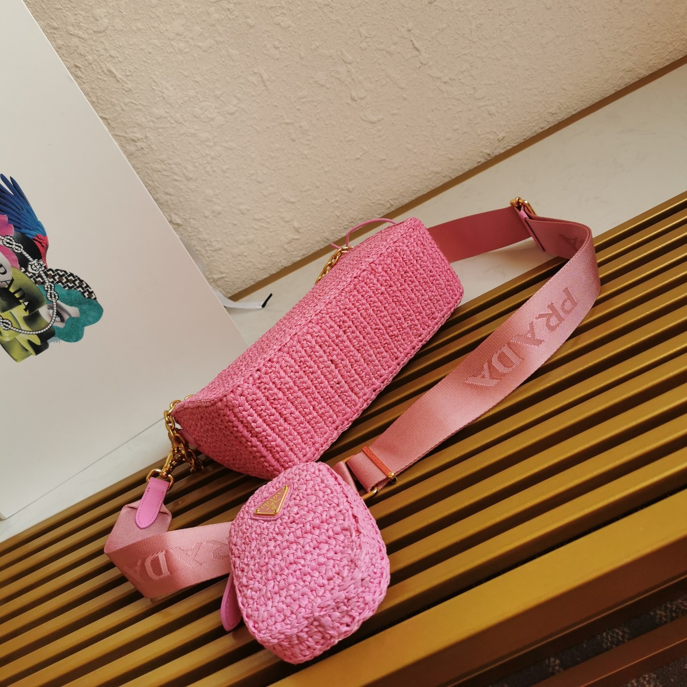Pra*a re-edition 2005 shoulder bag in pink raffia