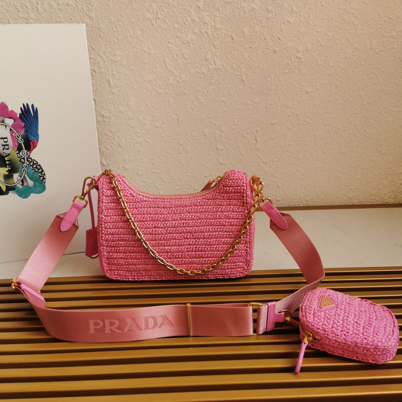 Pra*a re-edition 2005 shoulder bag in pink raffia