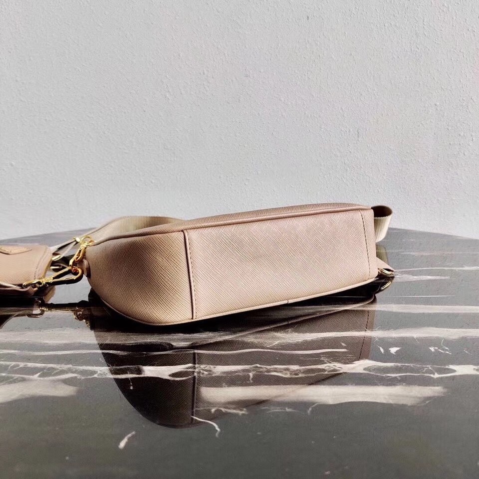 Pra*a re-edition 2005 shoulder bag in beige saffiano leather