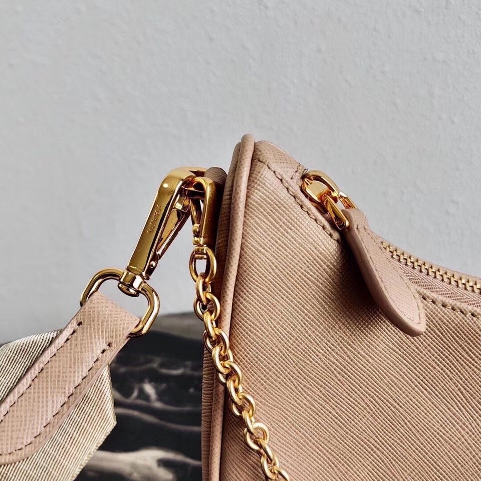 Pra*a re-edition 2005 shoulder bag in beige saffiano leather
