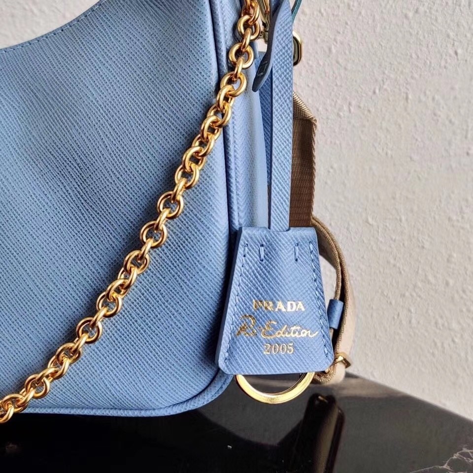 Pra*a re-edition 2005 shoulder bag in blue saffiano leather