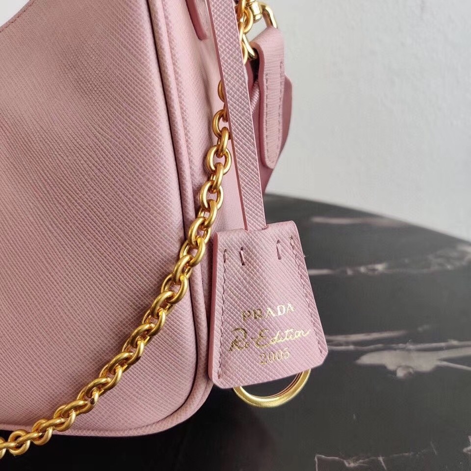 Pra*a re-edition 2005 shoulder bag in pink saffiano leather