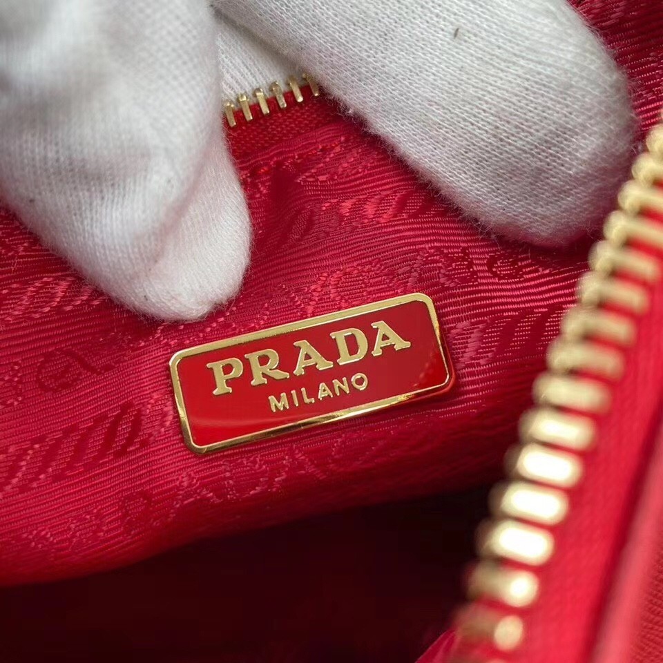 Pra*a re-edition 2005 shoulder bag in red saffiano leather