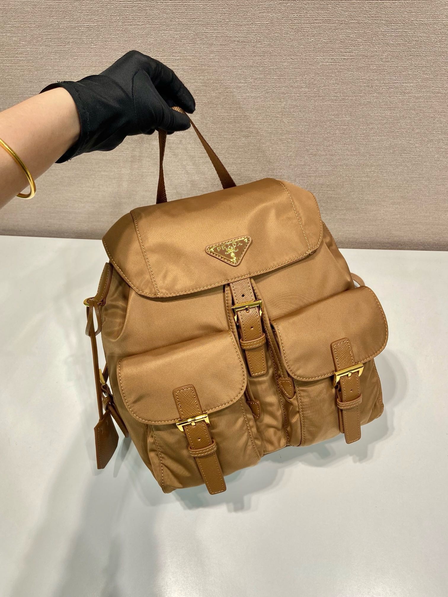 Pra*a re-edition 1978 small backpack in brown re-nylon