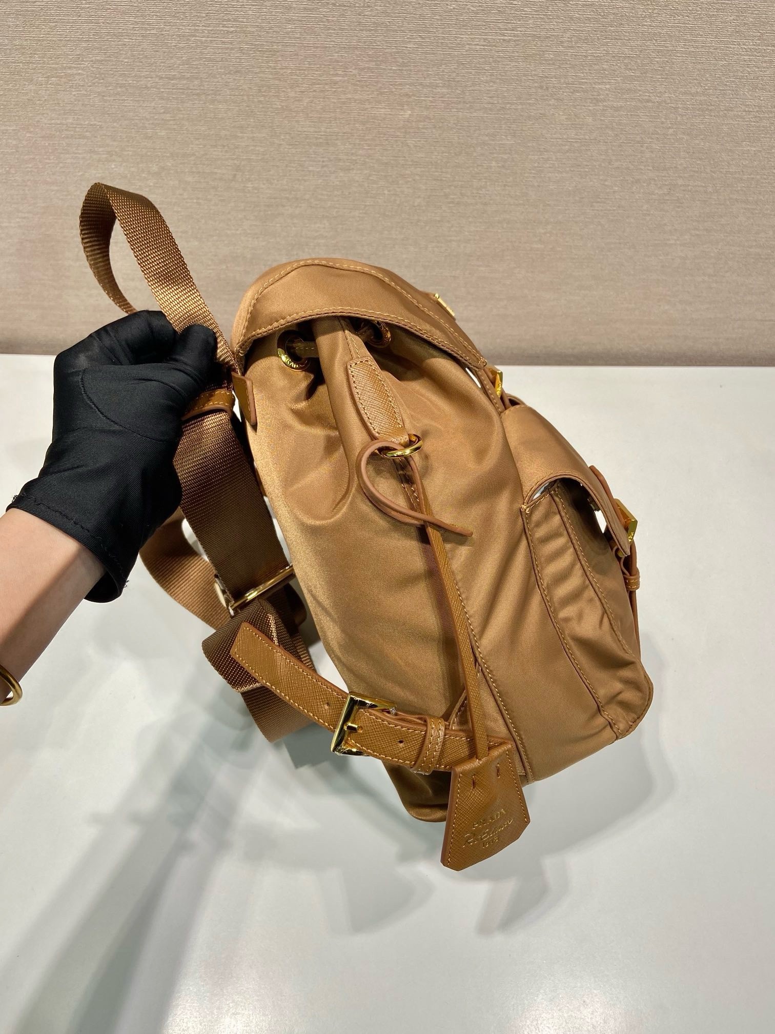 Pra*a re-edition 1978 small backpack in brown re-nylon