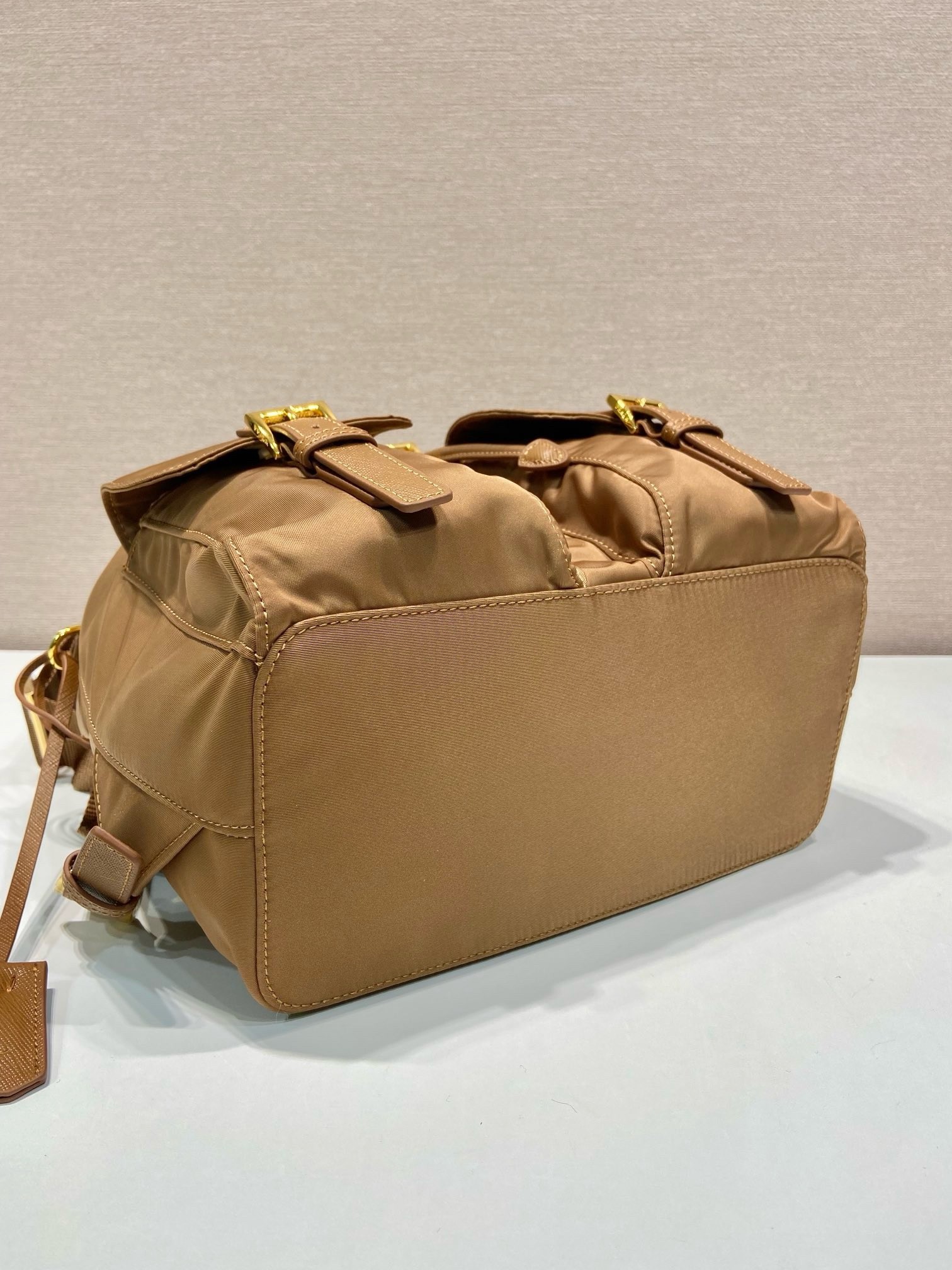 Pra*a re-edition 1978 small backpack in brown re-nylon