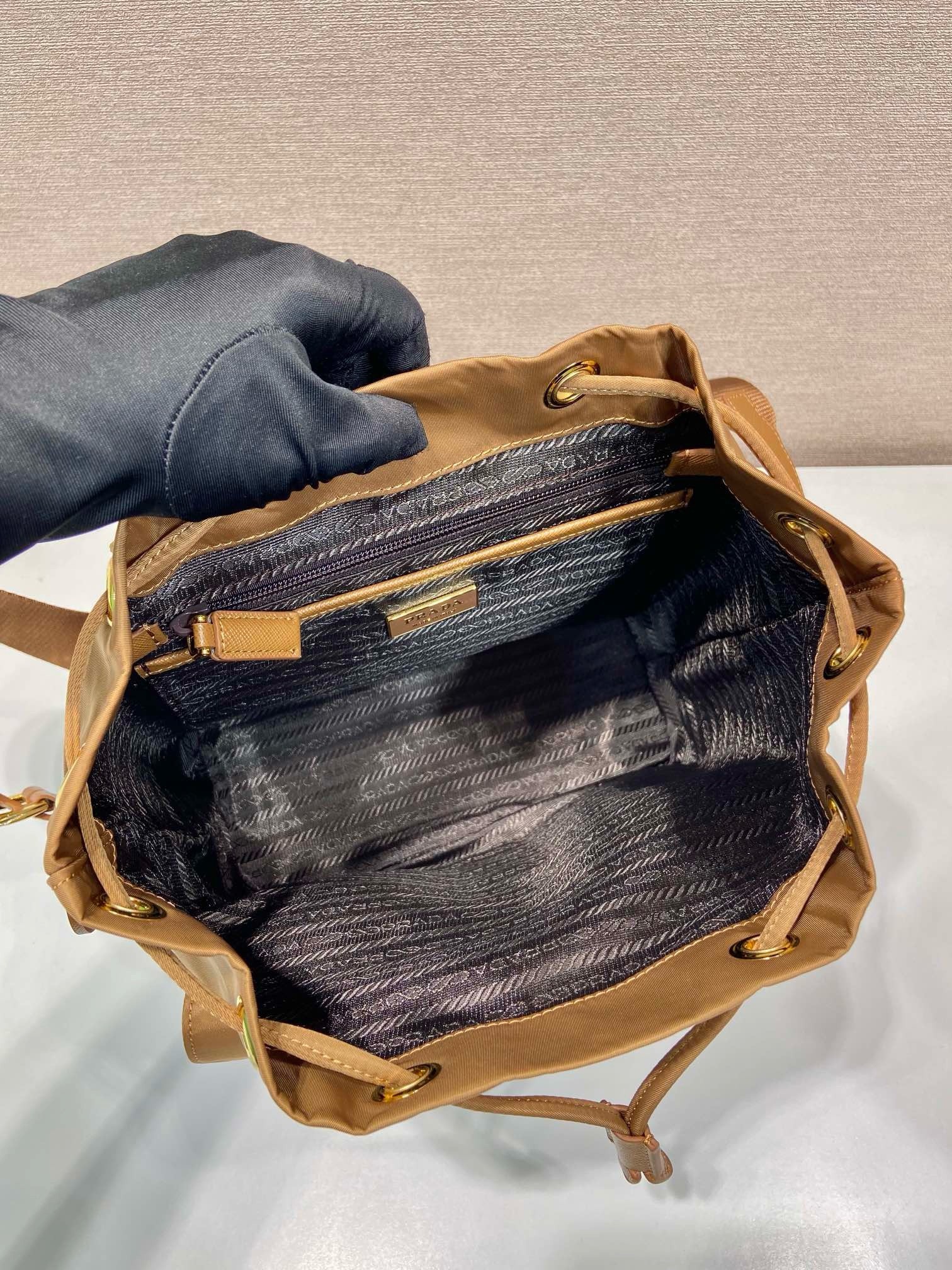 Pra*a re-edition 1978 small backpack in brown re-nylon