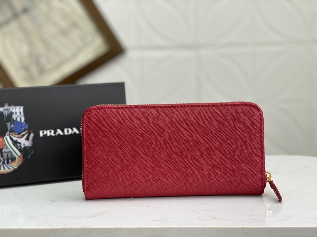 Pra*a zip around wallet in red saffiano calfskin