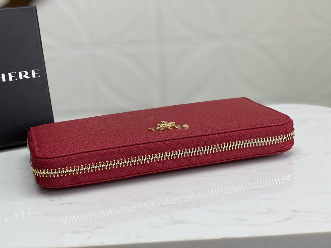 Pra*a zip around wallet in red saffiano calfskin