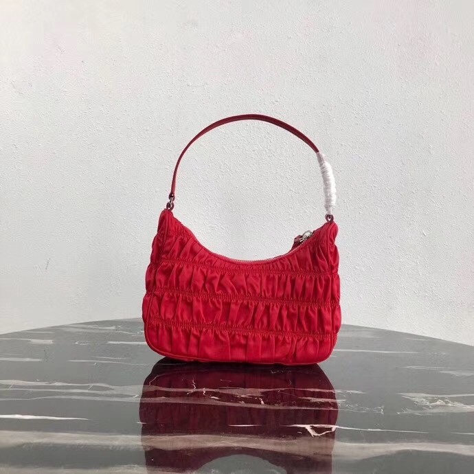 Pra*a mini hobo bag in red nylon and leather