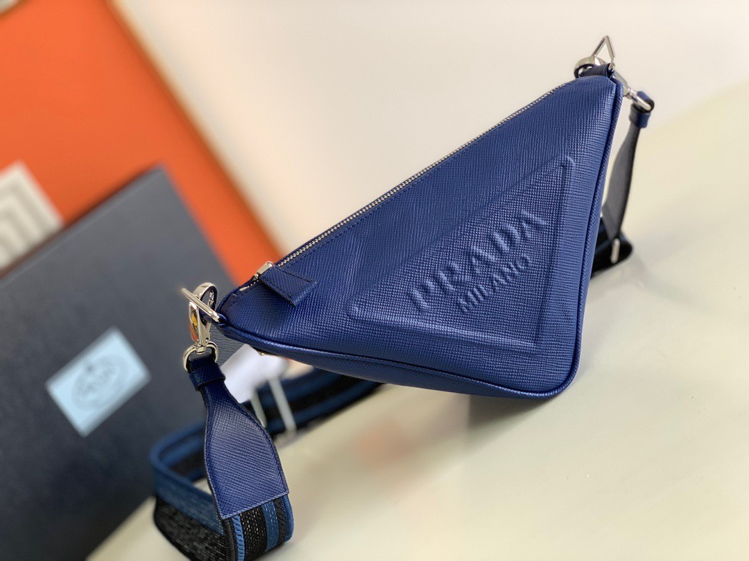 Pra*a triangle shoulder bag in blue saffiano calfskin