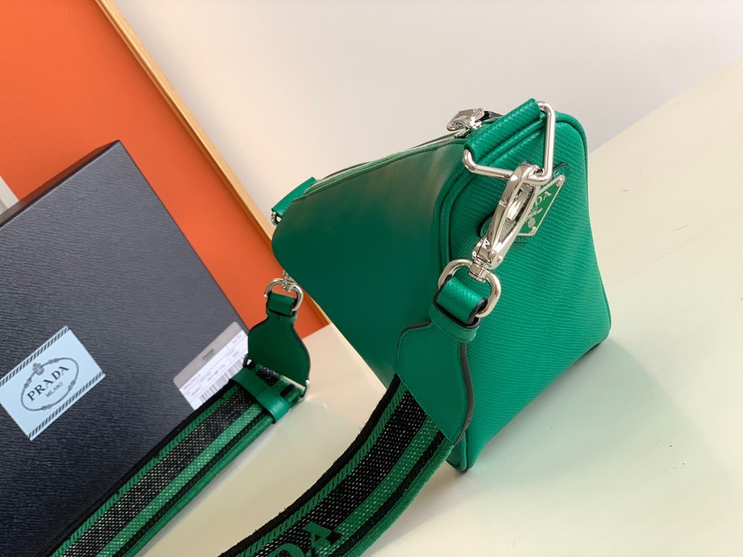 Pra*a triangle shoulder bag in green saffiano calfskin