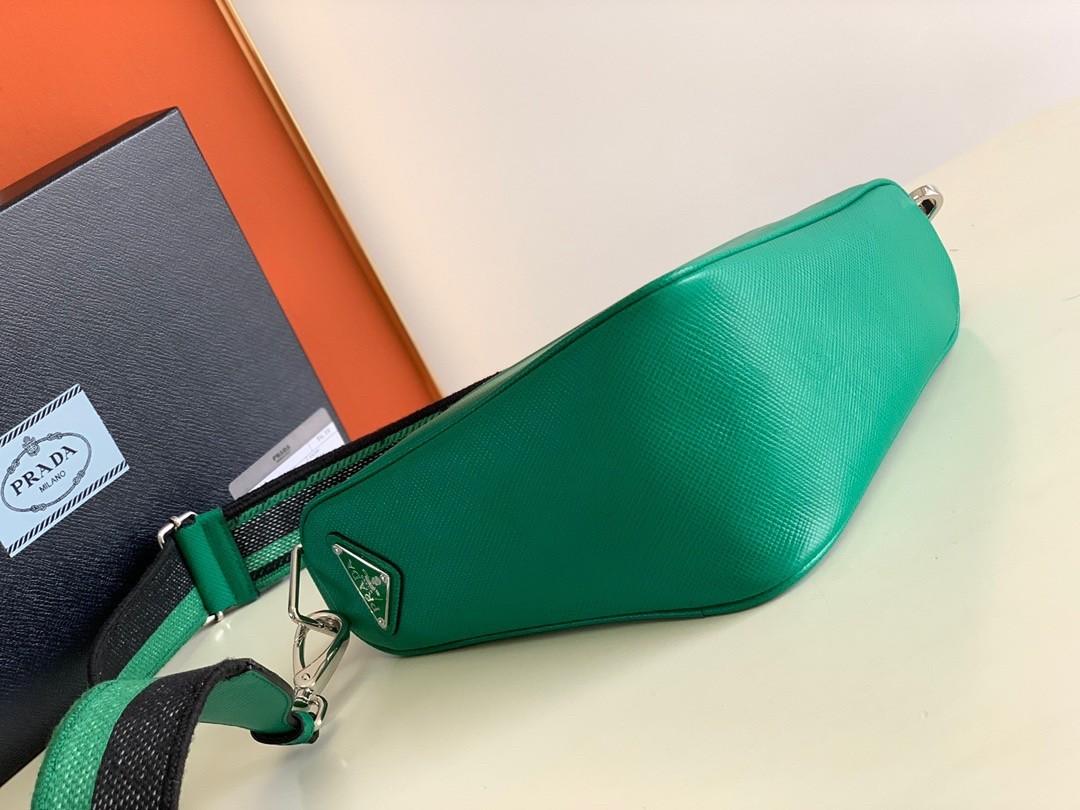 Pra*a triangle shoulder bag in green saffiano calfskin