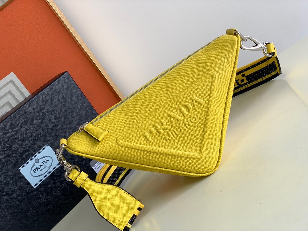 Pra*a triangle shoulder bag in yellow saffiano calfskin