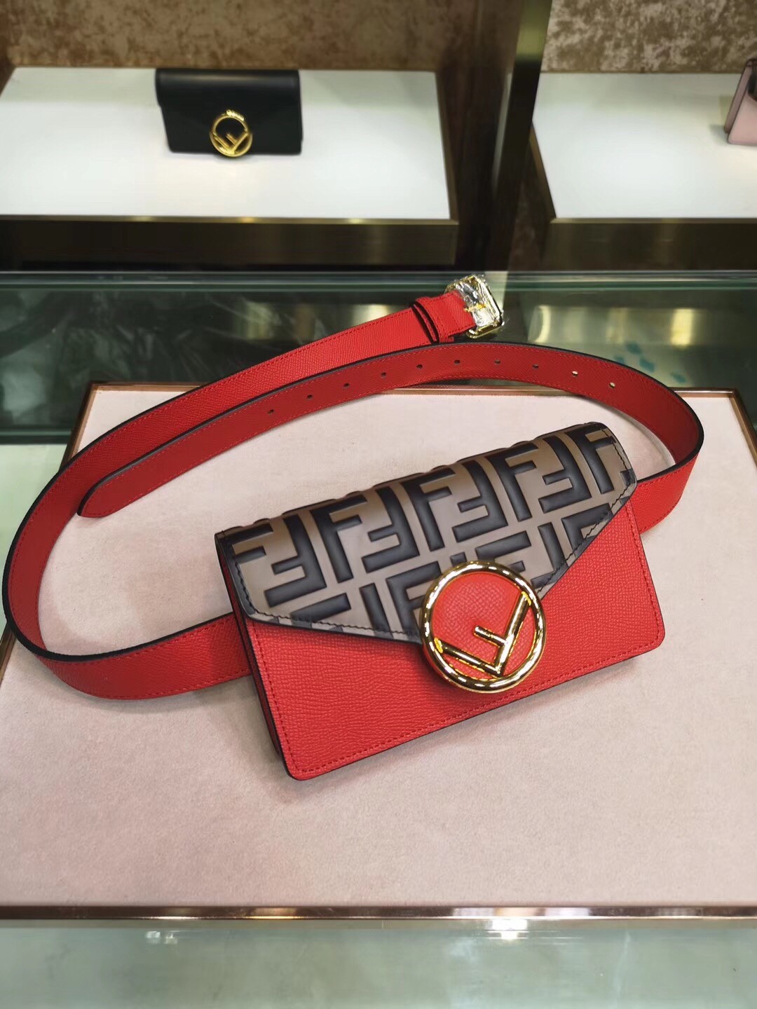 F**di red kan i f belt bag with ff motif
