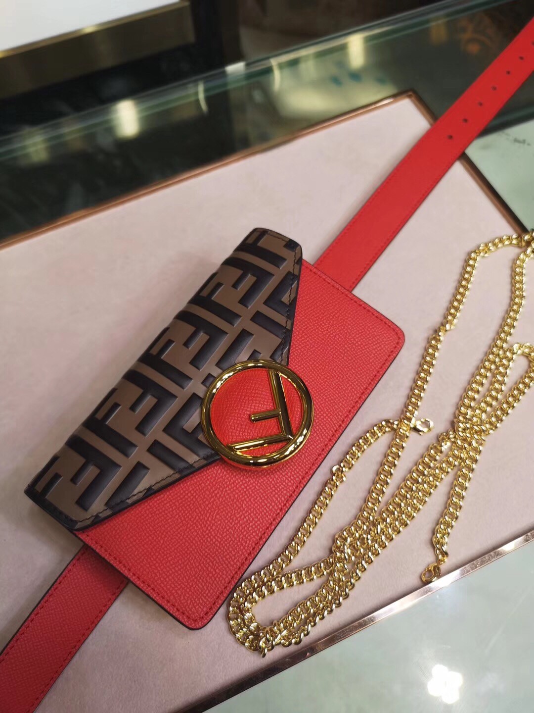 F**di red kan i f belt bag with ff motif