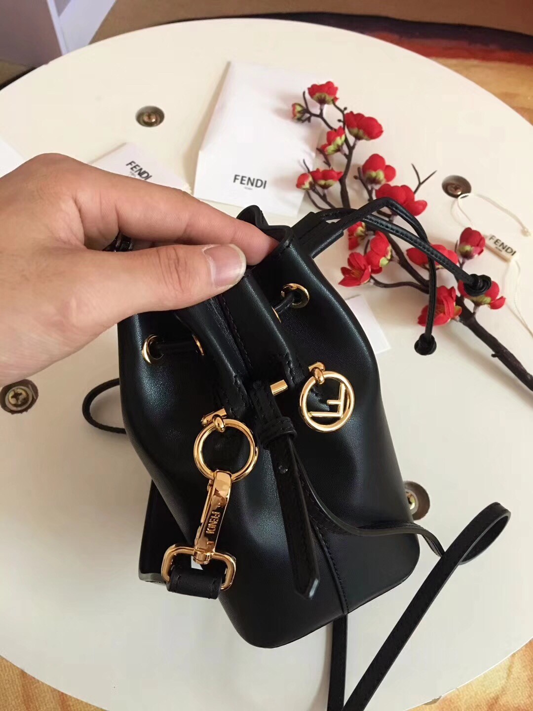 F**di mon tresor mini bucket bag in black calfskin