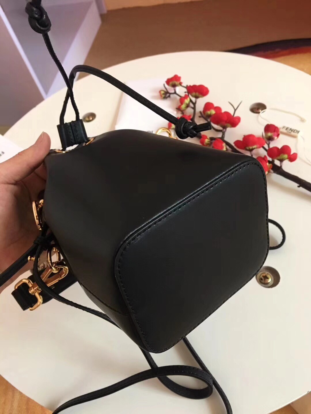 F**di mon tresor mini bucket bag in black calfskin