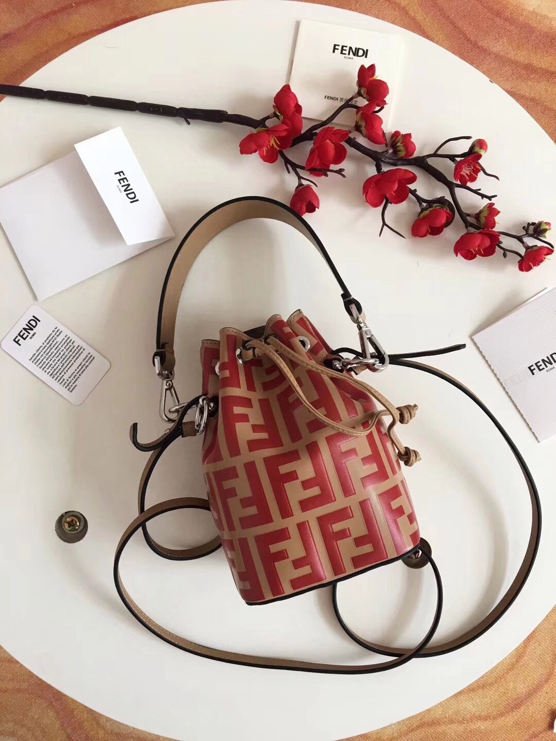 F**di ff mon tresor mini bucket bag in beige calfskin
