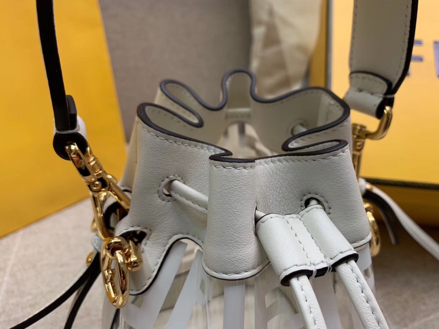 F**di white mon tresor mini bucket bag in transparent pu