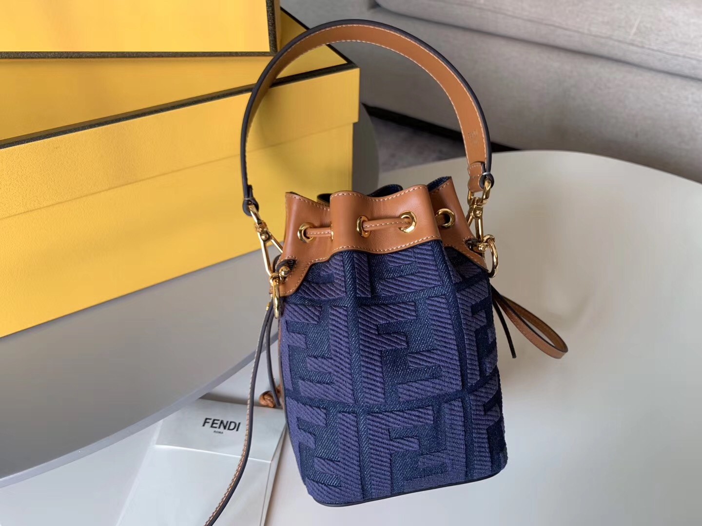 F**di mon tresor mini bucket bag in blue denim