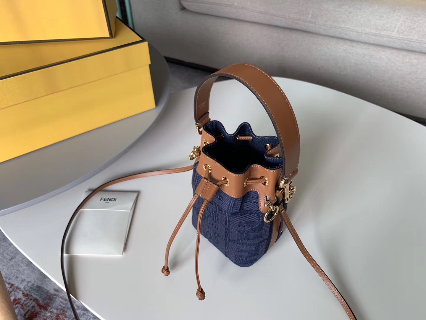 F**di mon tresor mini bucket bag in blue denim
