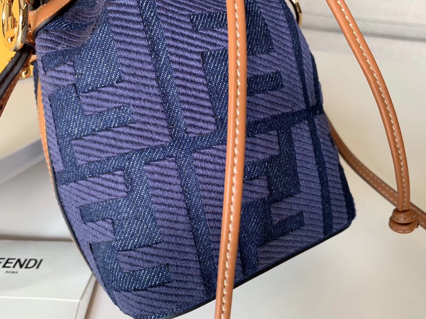 F**di mon tresor mini bucket bag in blue denim