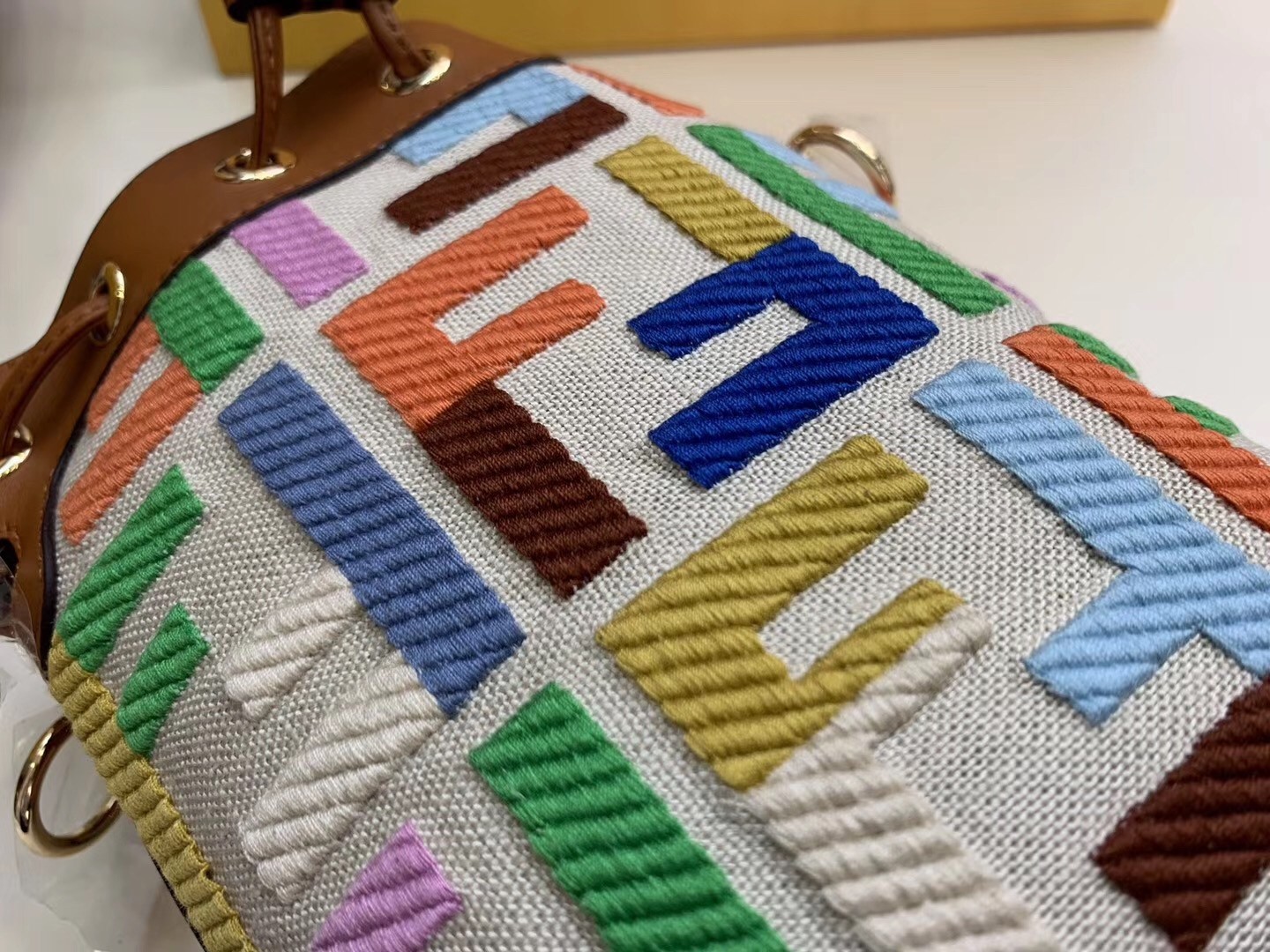 F**di mon tresor mini bucket bag in multicolour canvas