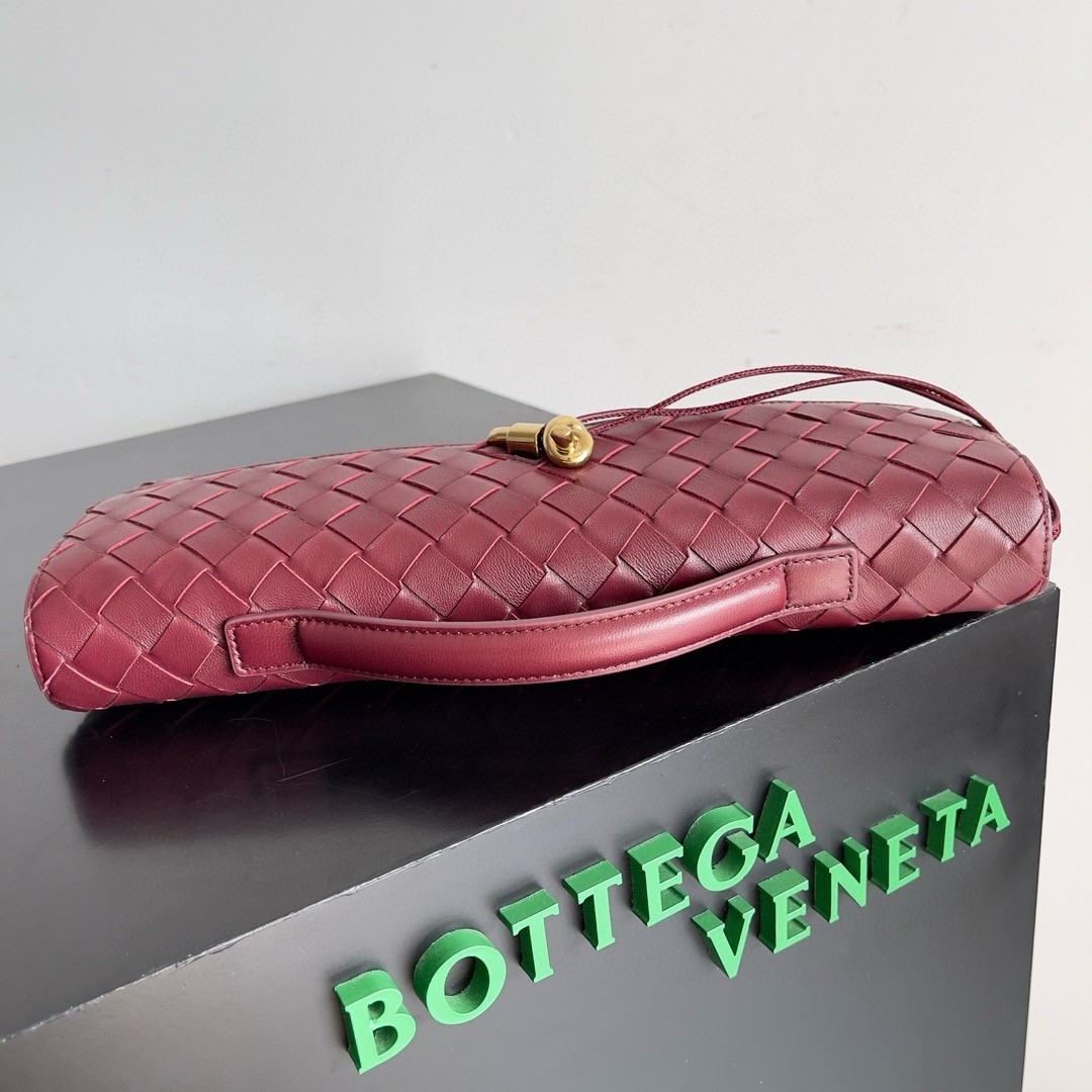 bo*te*ga Ve*ne*ta andiamo clutch with handle in barolo intrecciato lambskin