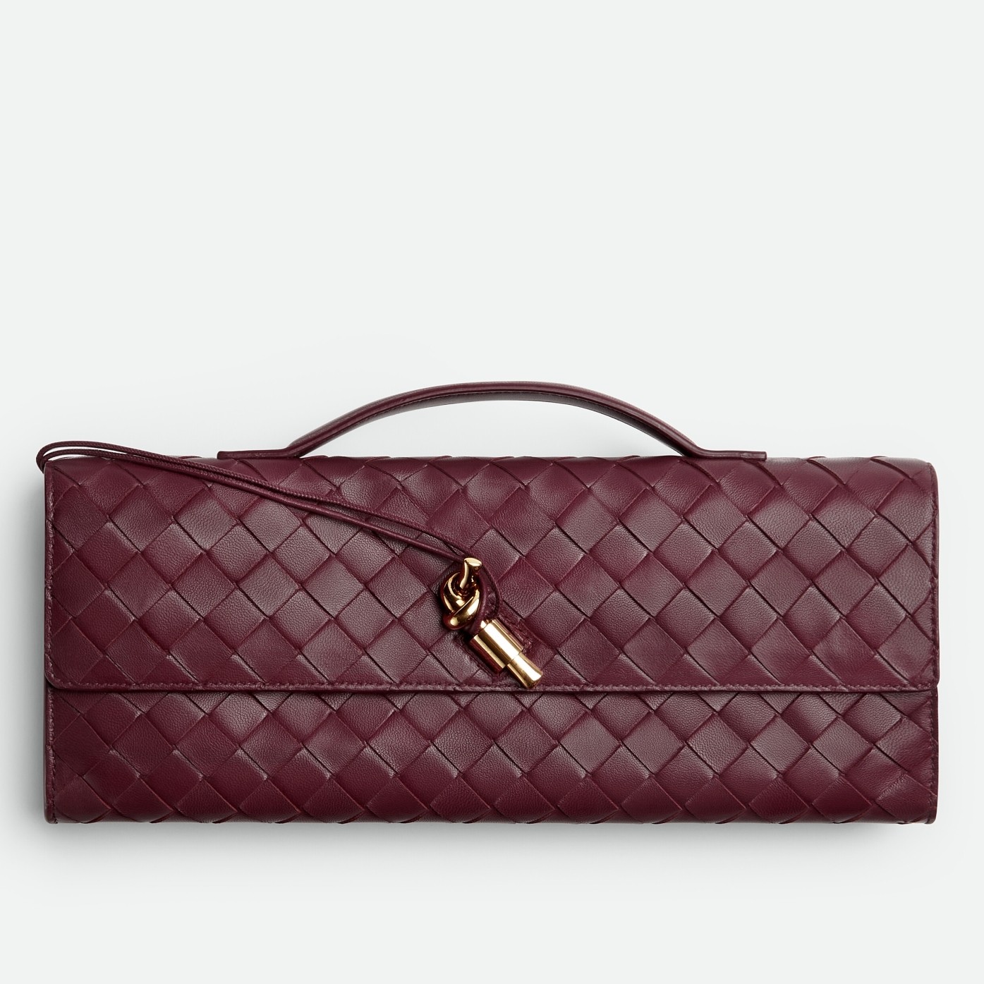 bo*te*ga Ve*ne*ta andiamo clutch with handle in barolo intrecciato lambskin