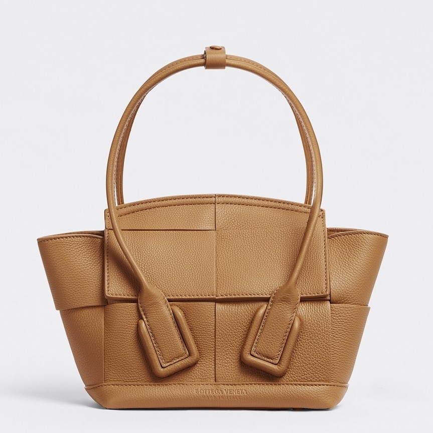 bo*te*ga Ve*ne*ta mini arco bag in caramel intrecciato leather