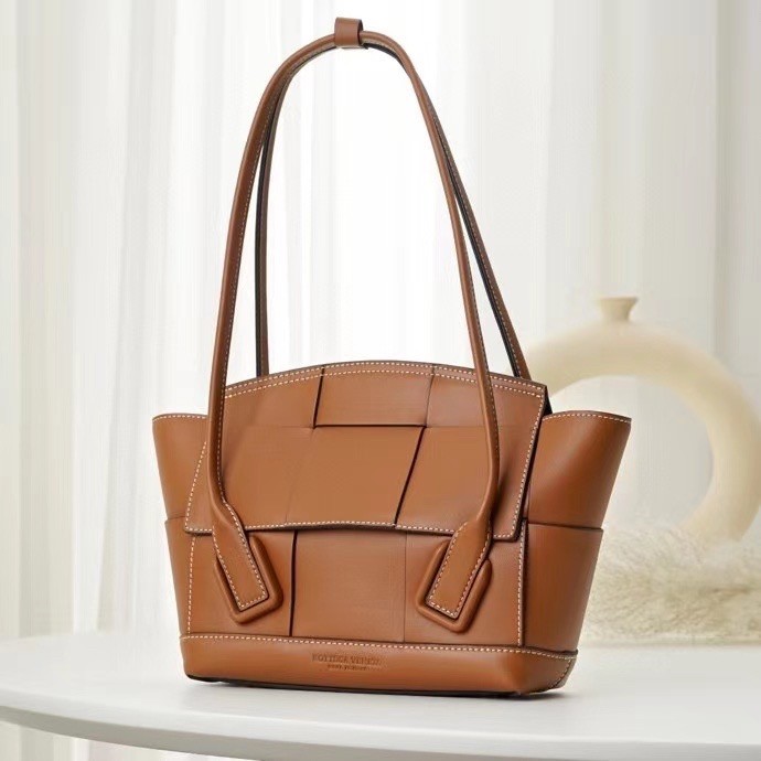 bo*te*ga Ve*ne*ta arco small bag in caramel intrecciato calfskin