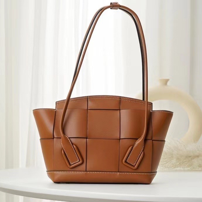 bo*te*ga Ve*ne*ta arco small bag in caramel intrecciato calfskin